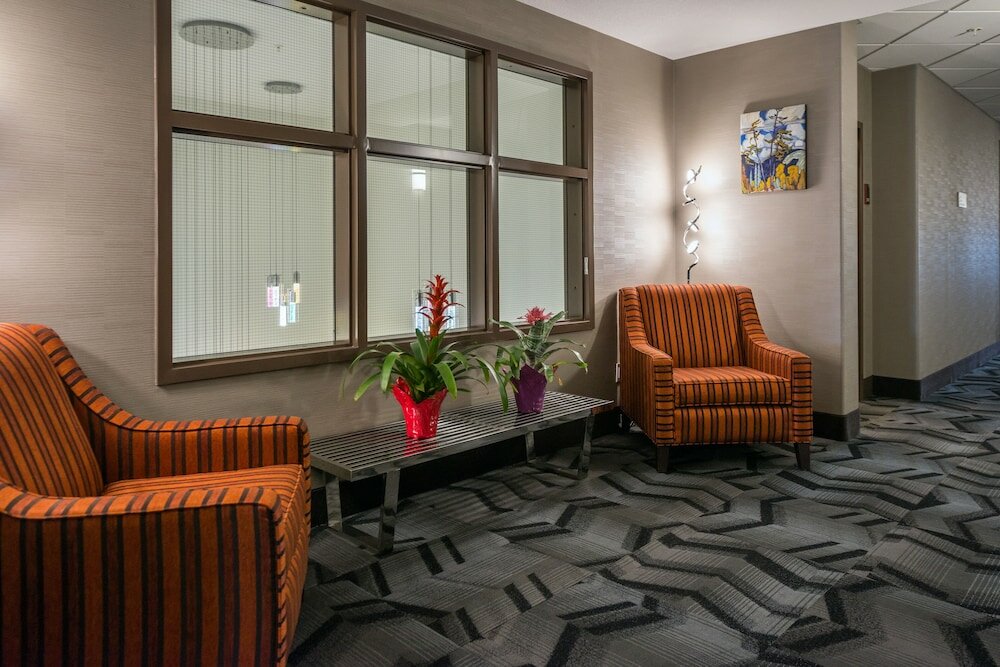 Фото Encore Suites by Service Plus Inns
