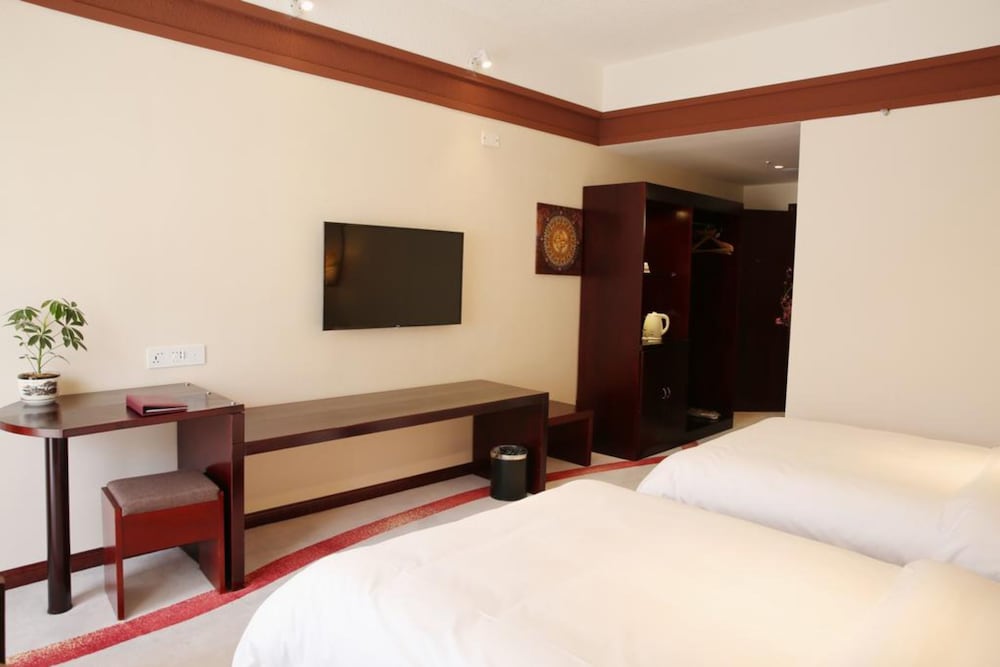 Фото Ramada Encore DaochengYading