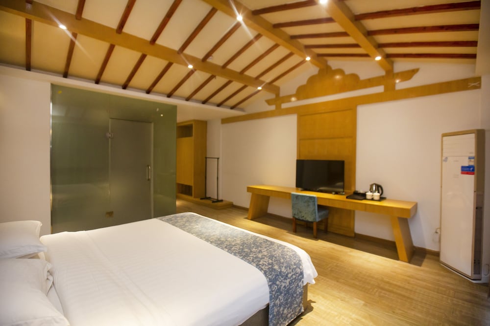 Фото Zhangjiajie Yunqi Inn