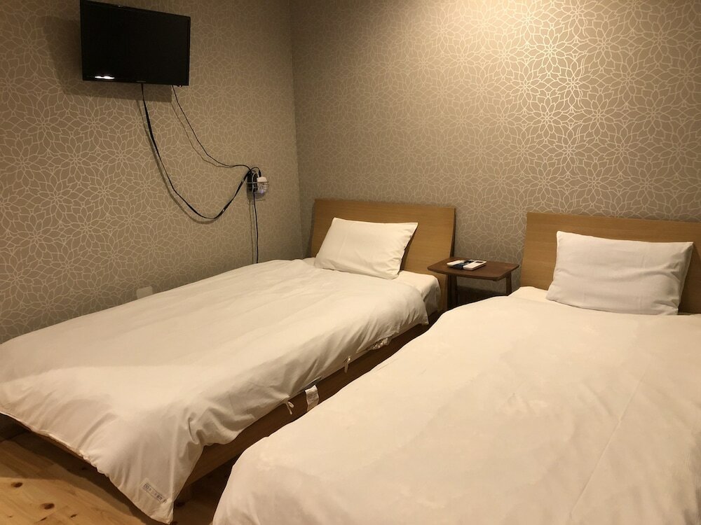 Фото Shimanouchi Luxury Apartment