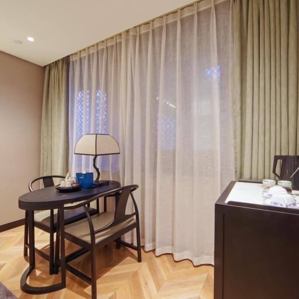 Фото Sanfang Qixiang Shuxiang Wenru Hotel