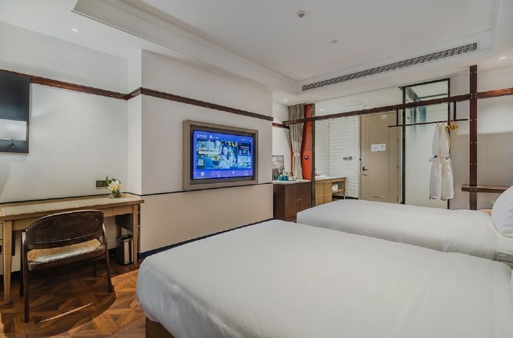 Фото Manxin Hotel Qingdao Zhanqiao