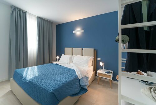 Апартаменты Stylish Residenza Torre Bianca 2 Bedroom Apartment Sleeps 5 в Линьяно-Саббьядоро