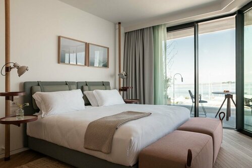 Гостиница Laguna Faro Suites - Adults Only & Free Beach в Градо