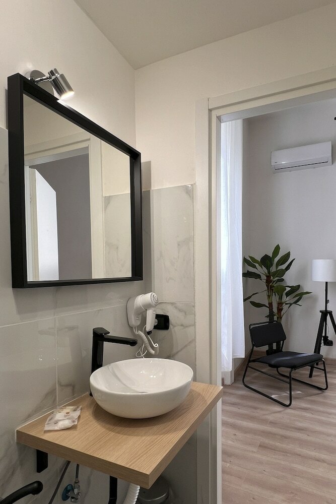 Фото Cozy Rooms Napoli