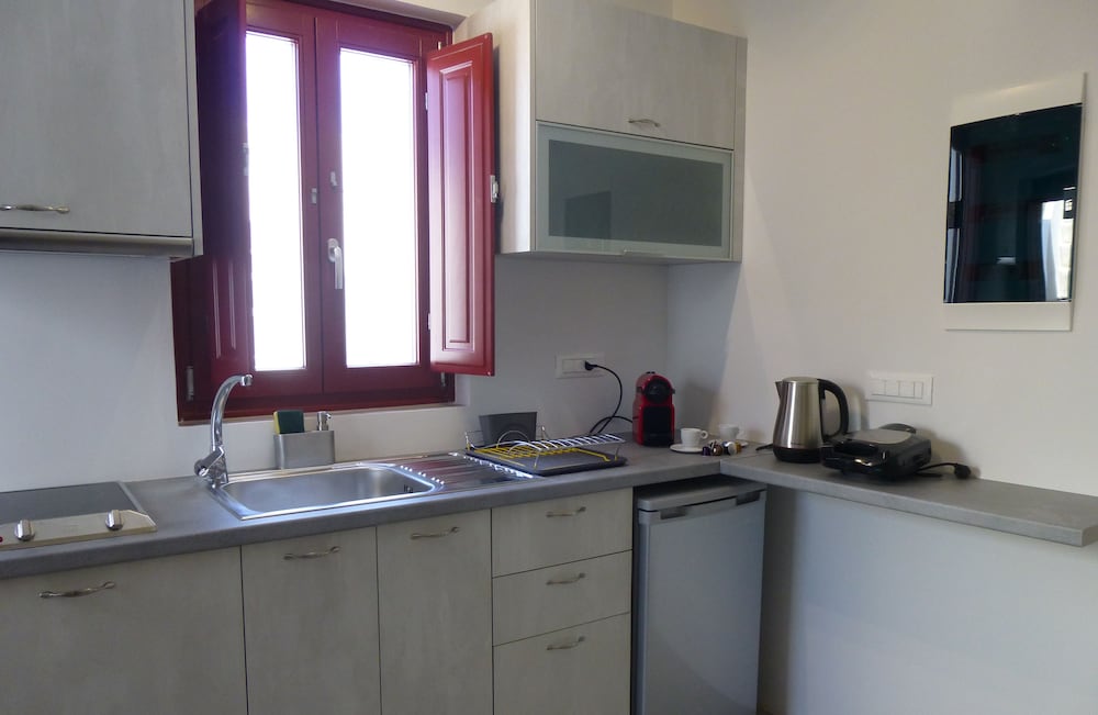 Фото Aplada Suites