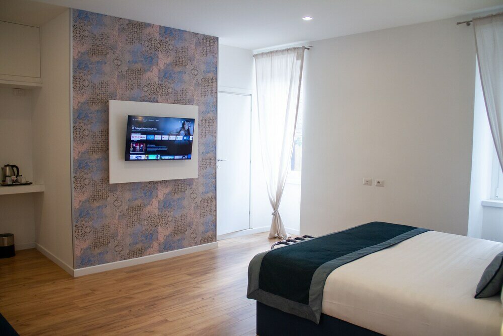 Фото Home at Rome Vatican Suites