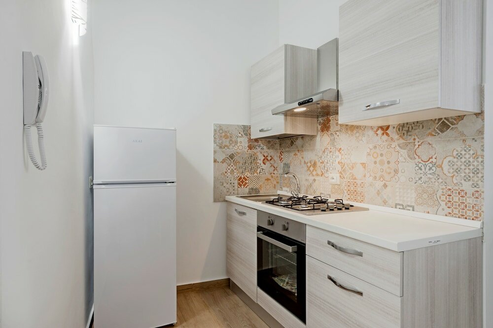 Фото Trinità 57 Apartments