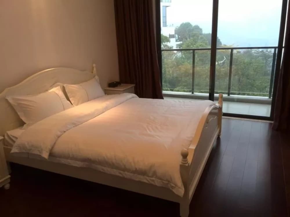 Фото Yumi Apartment-Quan Tian Xia Branch