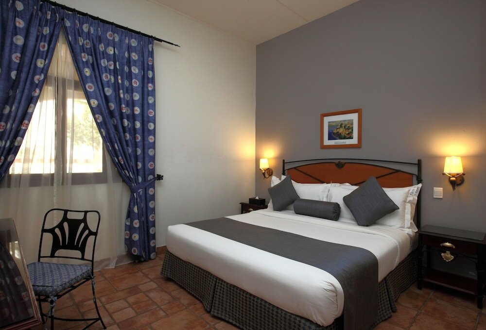 Фото Mena Holiday Beach Resort Half Moon Bay