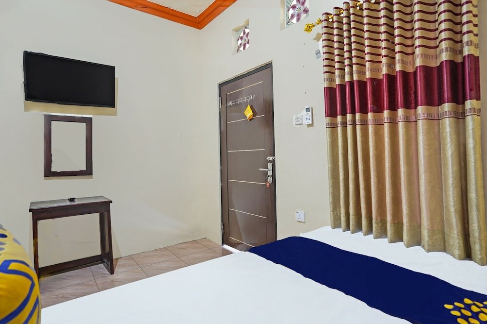 Фото Spot On 92527 Penginapan Kangean Syariah