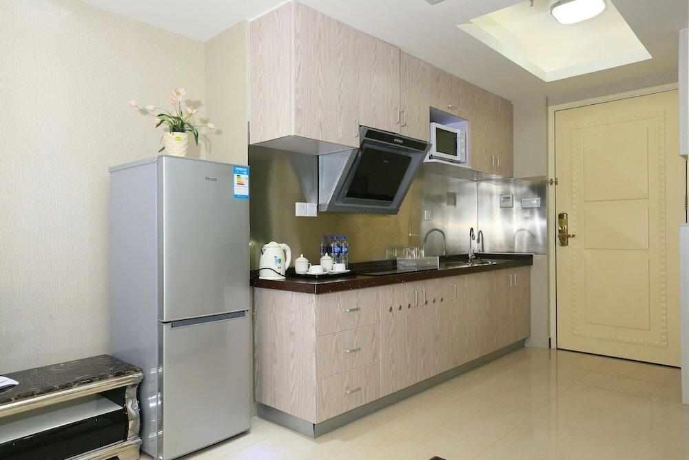 Фото Yoyo International Apartment