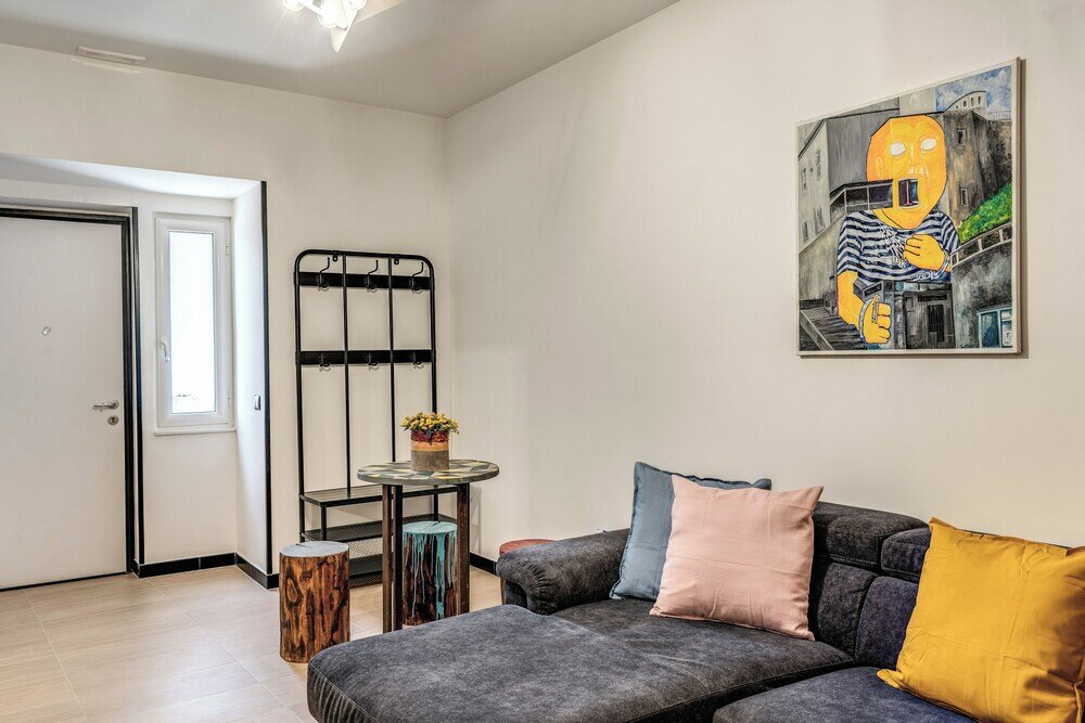 Фото The Quarters Naples Apartment