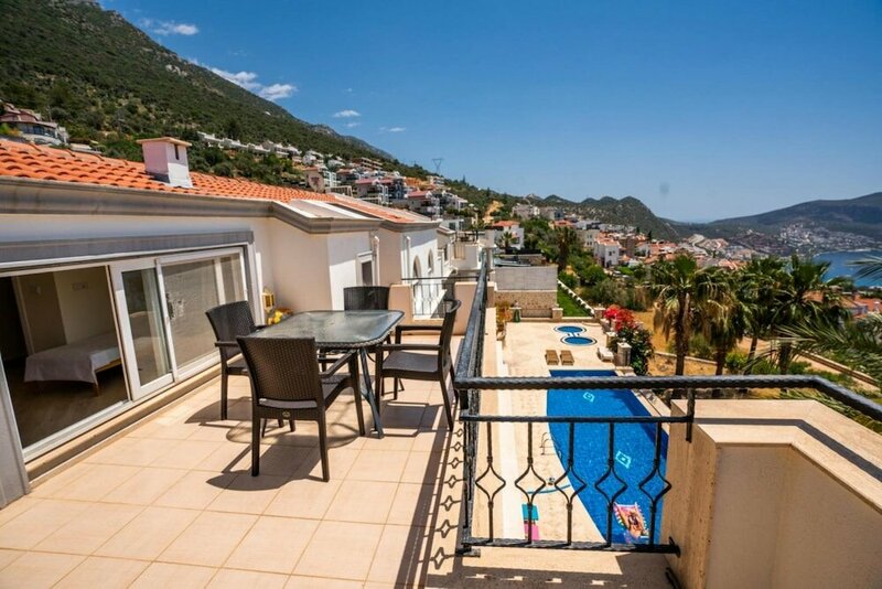 Апартаменты Lovely Flat Near Beach With Shared Pool in Kalkan в Калкане