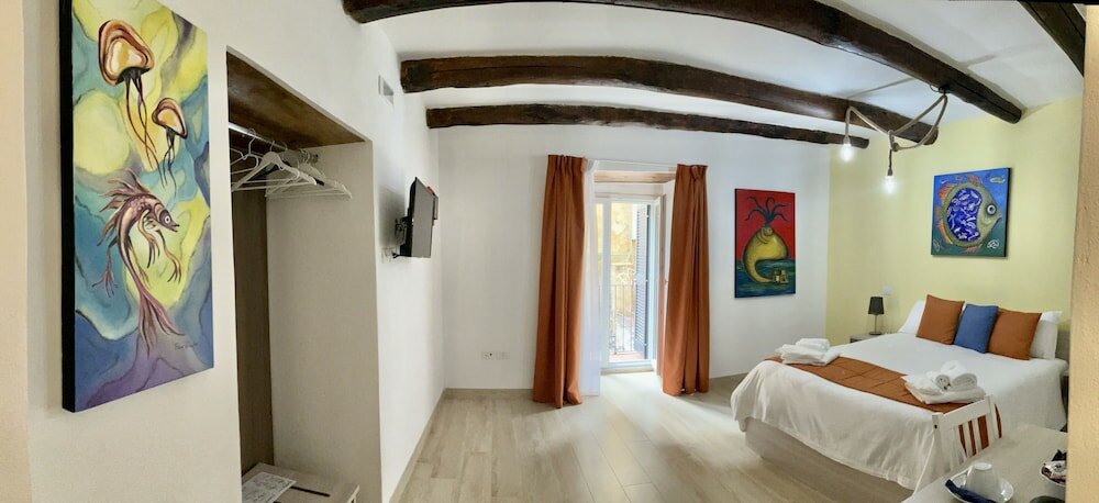 Фото A Room de Scugnizzi