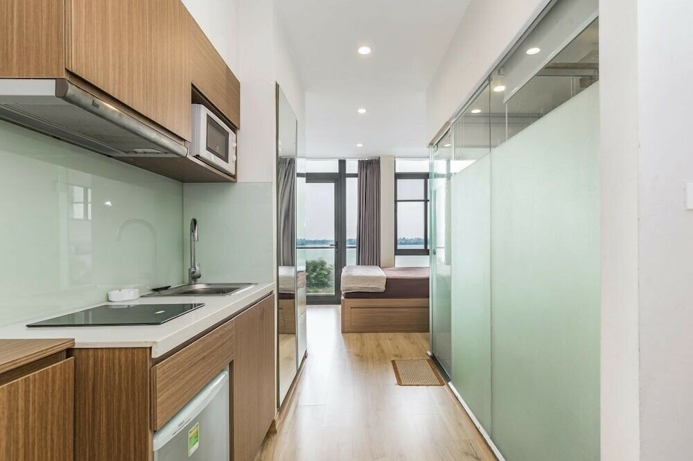 Фото Lotus Inn Serviced Apartment