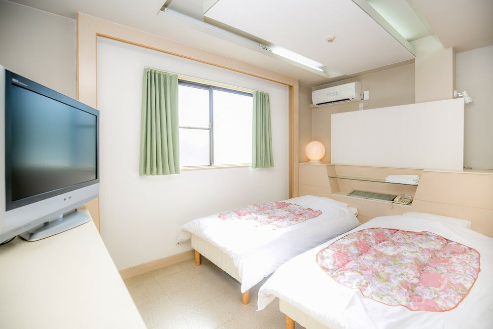 Фото Kanku Kokusai Hotel