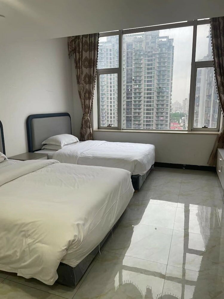 Фото Yoyo International Apartment