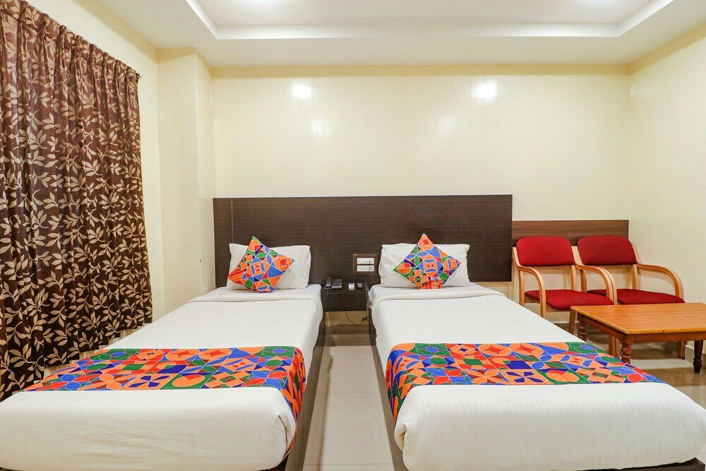 Фото Fabhotel Champion Residency