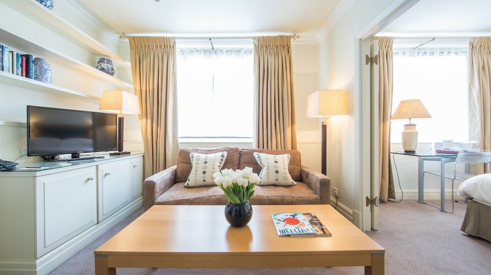 Фото The Capital Hotel Apartments & Townhouse