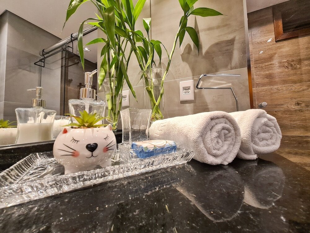 Фото Dúplex Luxo com Piscina Aquecida, Lareira e Wifi