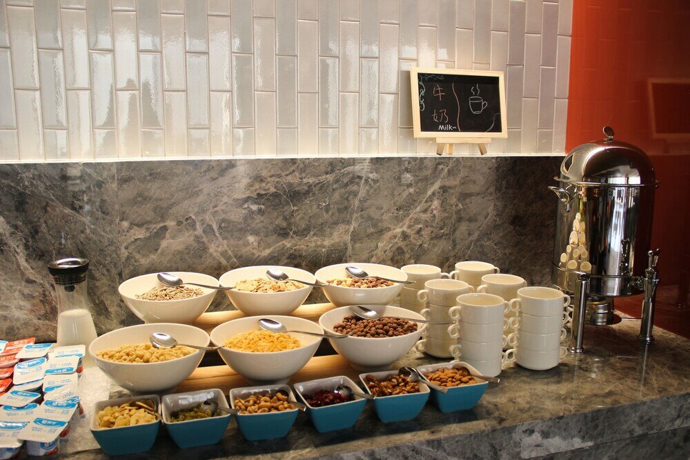 Фото Mumian Rizhao Hotel
