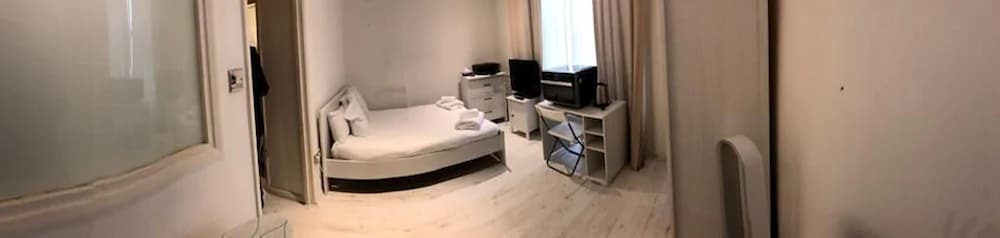 Фото Cosy Studio Flat in Central London