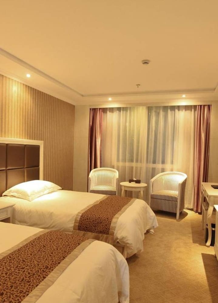 Фото Zhongdun Boutique Hotel