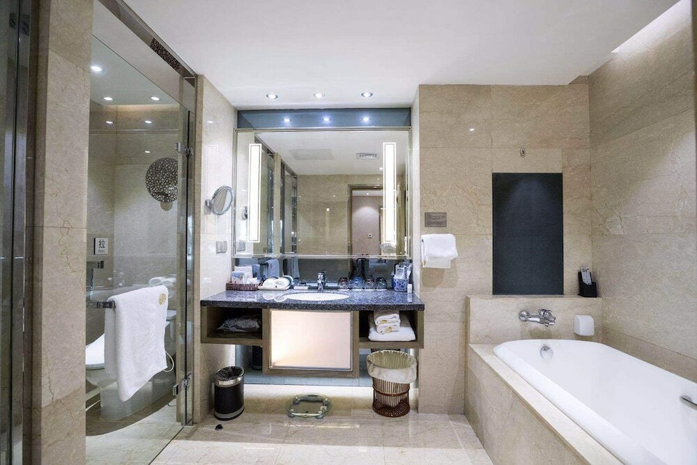 Фото Suning Universal Hotel All-Suites