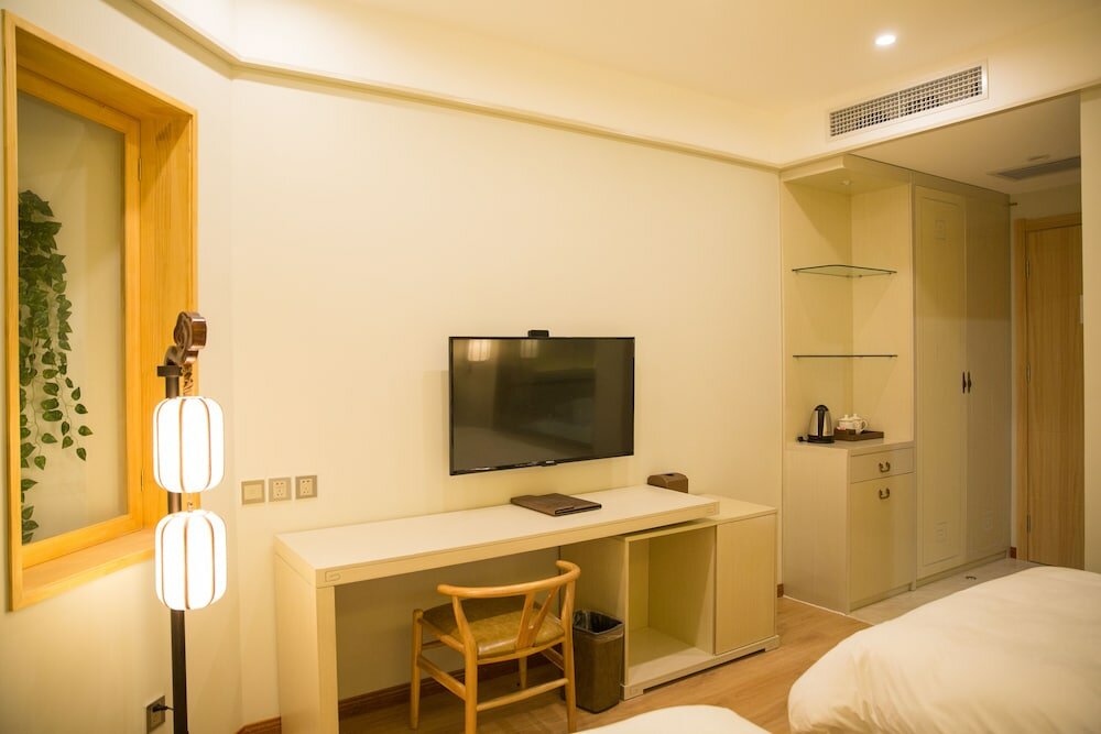 Фото Yitingzhenshe Hotel