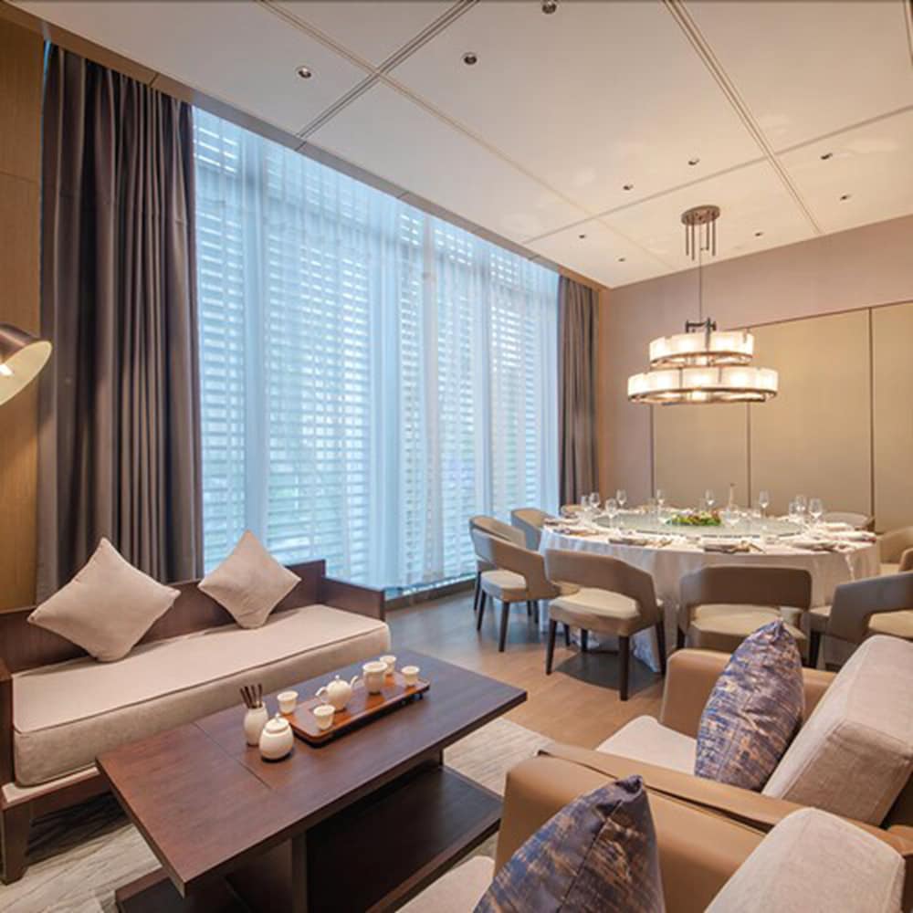 Фото New Century Hotel Zhenhai