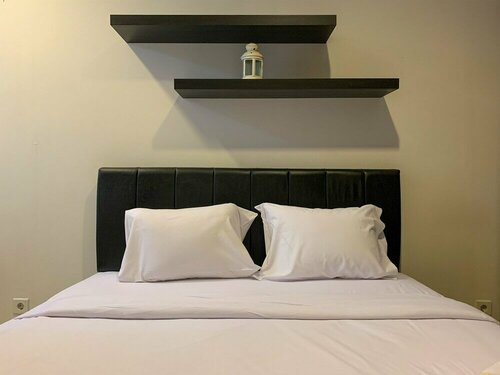 Гостиница Warm and Modern Cozy 2br @ Cinere Bellevue Apartment в Депоке