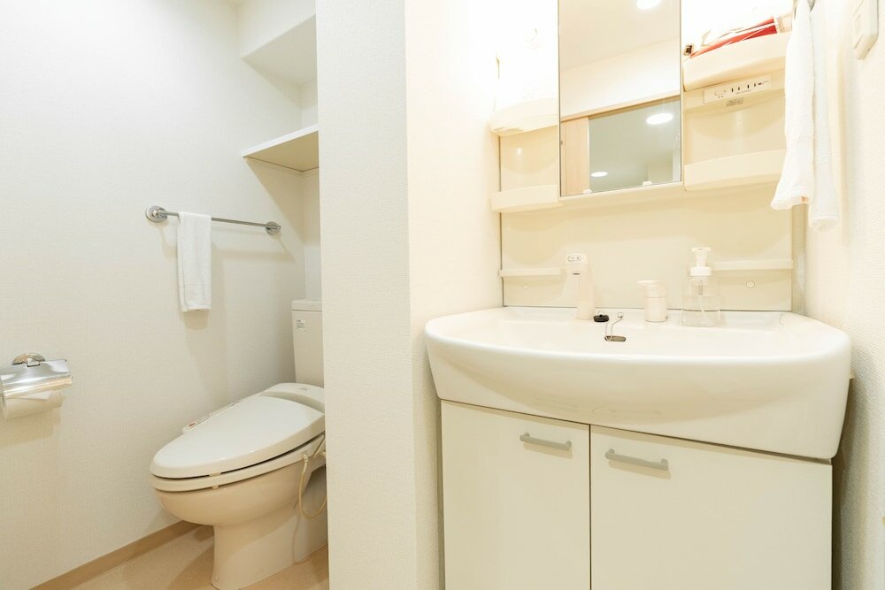 Фото Shinsaibash East Nana Apartment · Junan