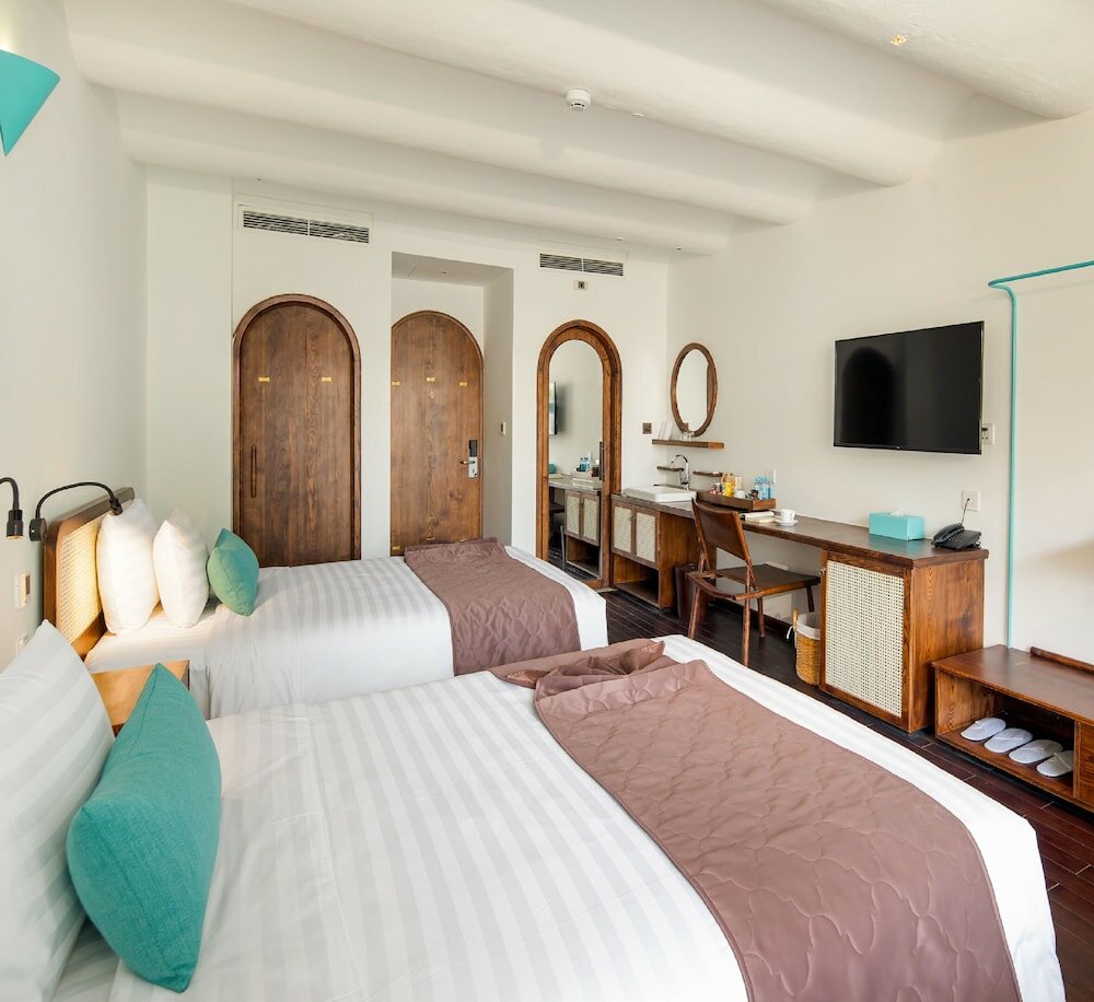 Фото Le Bouton Hotel