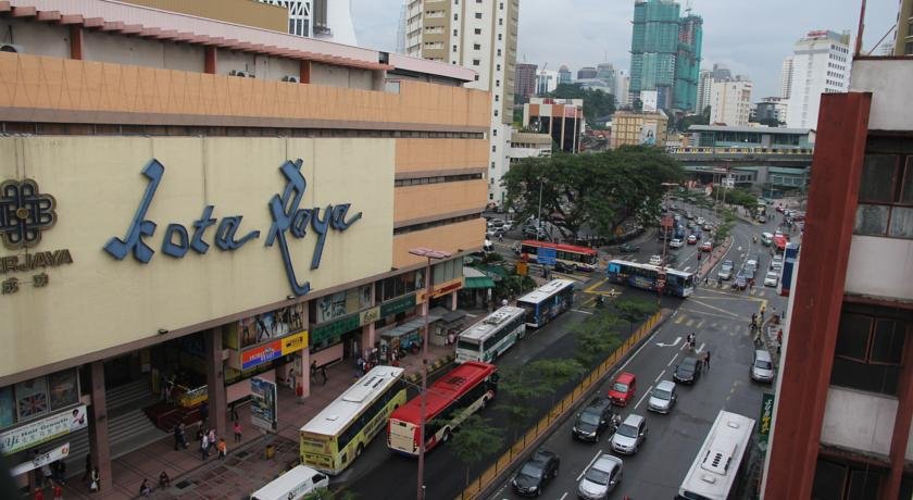 Фото Oyo 615 Dragon Inn Premium Hotel