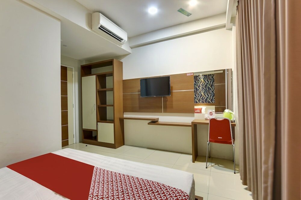 Фото Oyo Flagship 90973 Hotel Karunia Pkpri