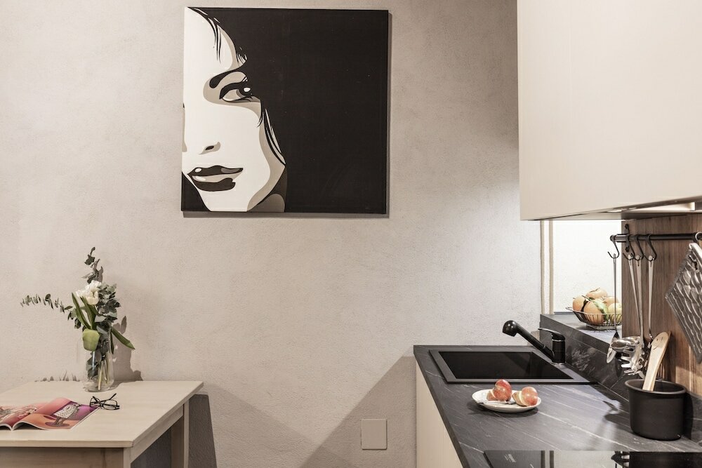 Фото Roommo Apartments