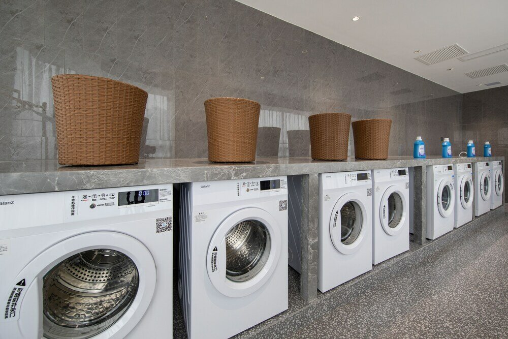 Фото Gz Baiyun Airport MeHood Liz Hotel T1