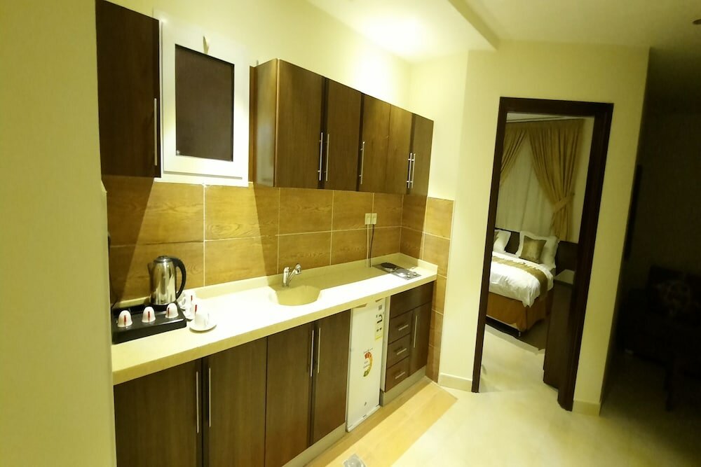 Фото The Blue Rose Hotel - الورده الزرقاء للوحدات السكنيه