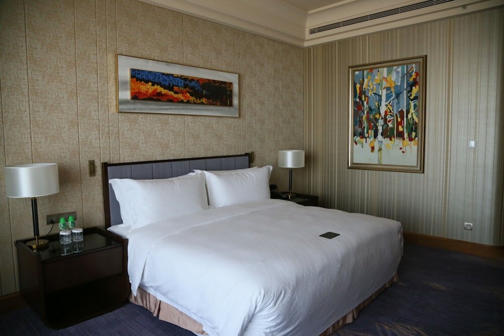 Фото Chateau Star River Qing Dao