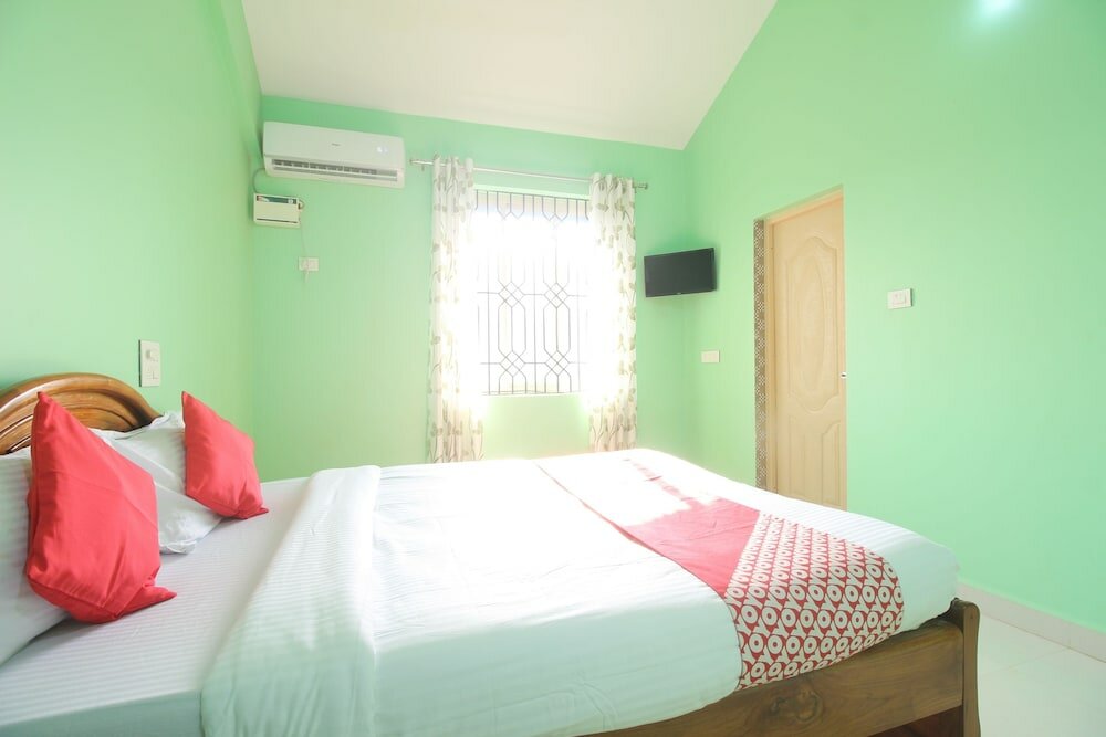 Фото Oyo 39345 Chrisander's Resort