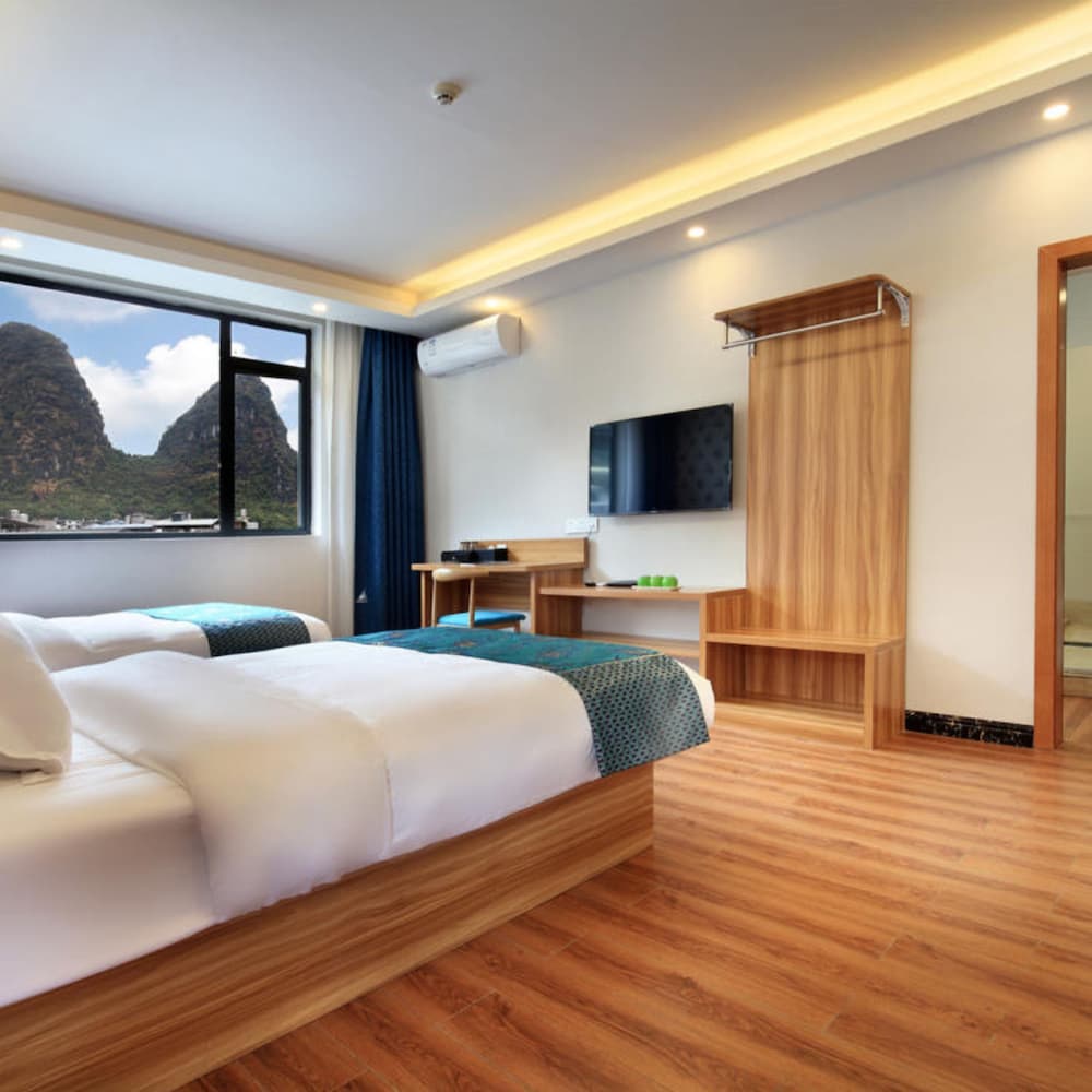 Фото Yangshuo Qingyunge Hotel