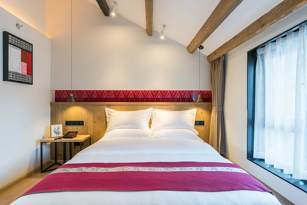 Фото Heyue moxie Hotel Lijiang