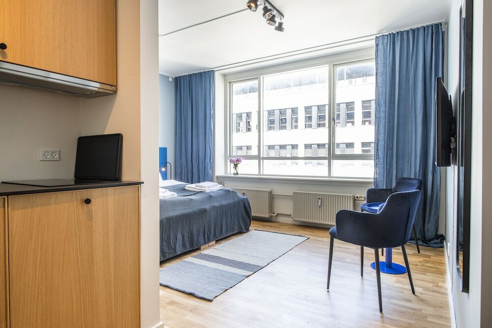 Фото By the Lakes apartments - Into This Place