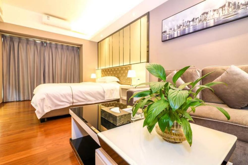 Фото BaiHe International Apartment Hotel