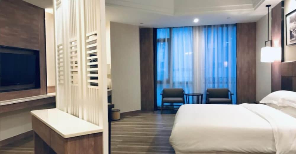 Фото Auden International Hotel