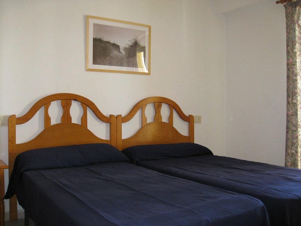 Фото Apartamentos la Reina