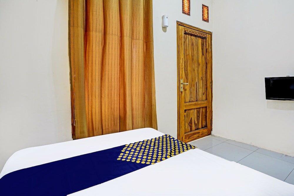 Фото Spot On 91824 Rumah Kaloka Syariah