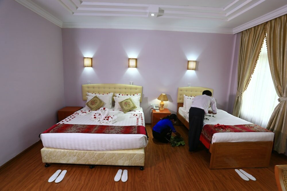 Фото The Floral Breeze Wun Zin Hotel