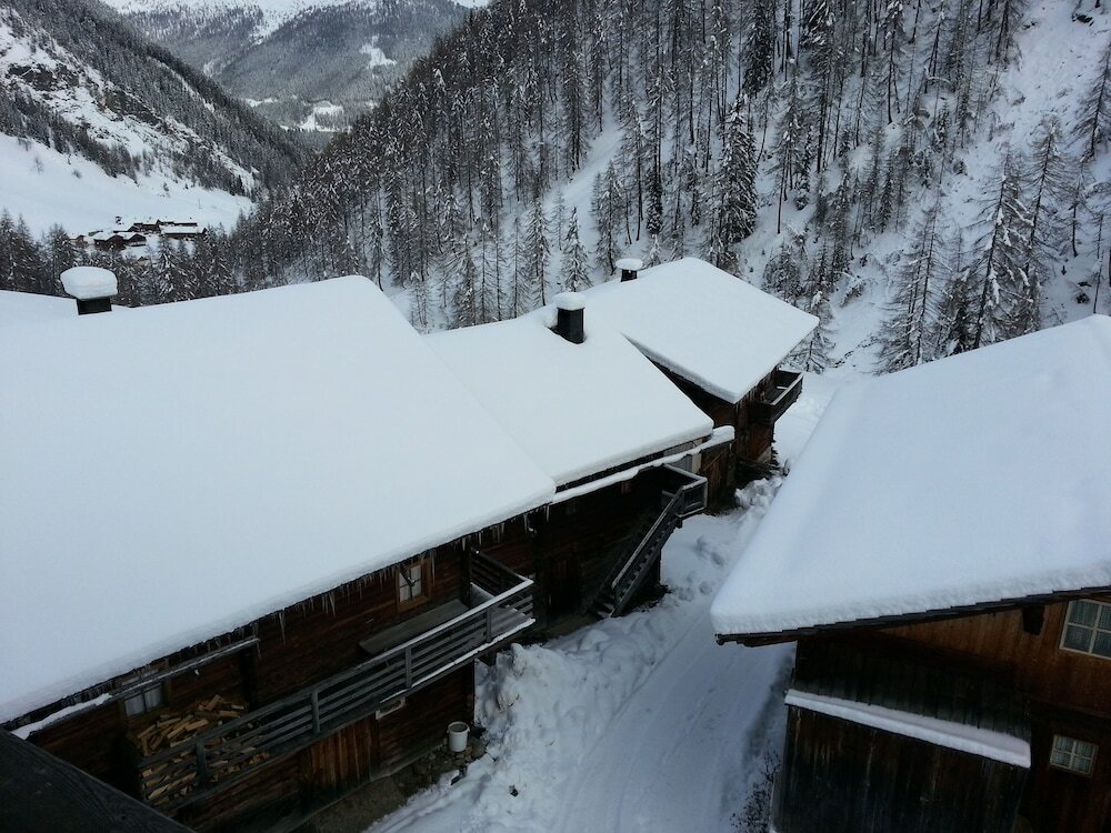 Фото Ferienwohnungen am Berg - Almhütte Alfen